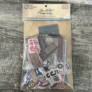 Tim Holtz Ephemera Pack “Expedition” craft supplies.